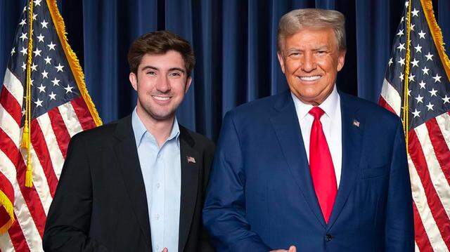 The Miami-Dade Republican Party chair, Kevin Cooper, with President Donald Trump.